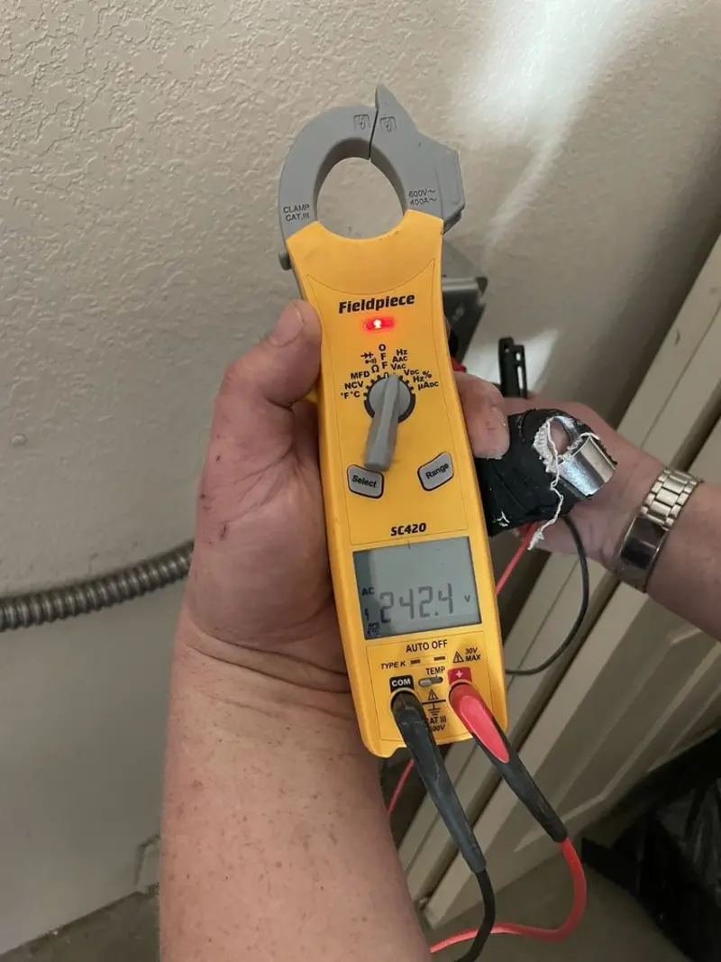 Voltage testing with clamp meter during Recessed Lighting Installation in Bridgeview